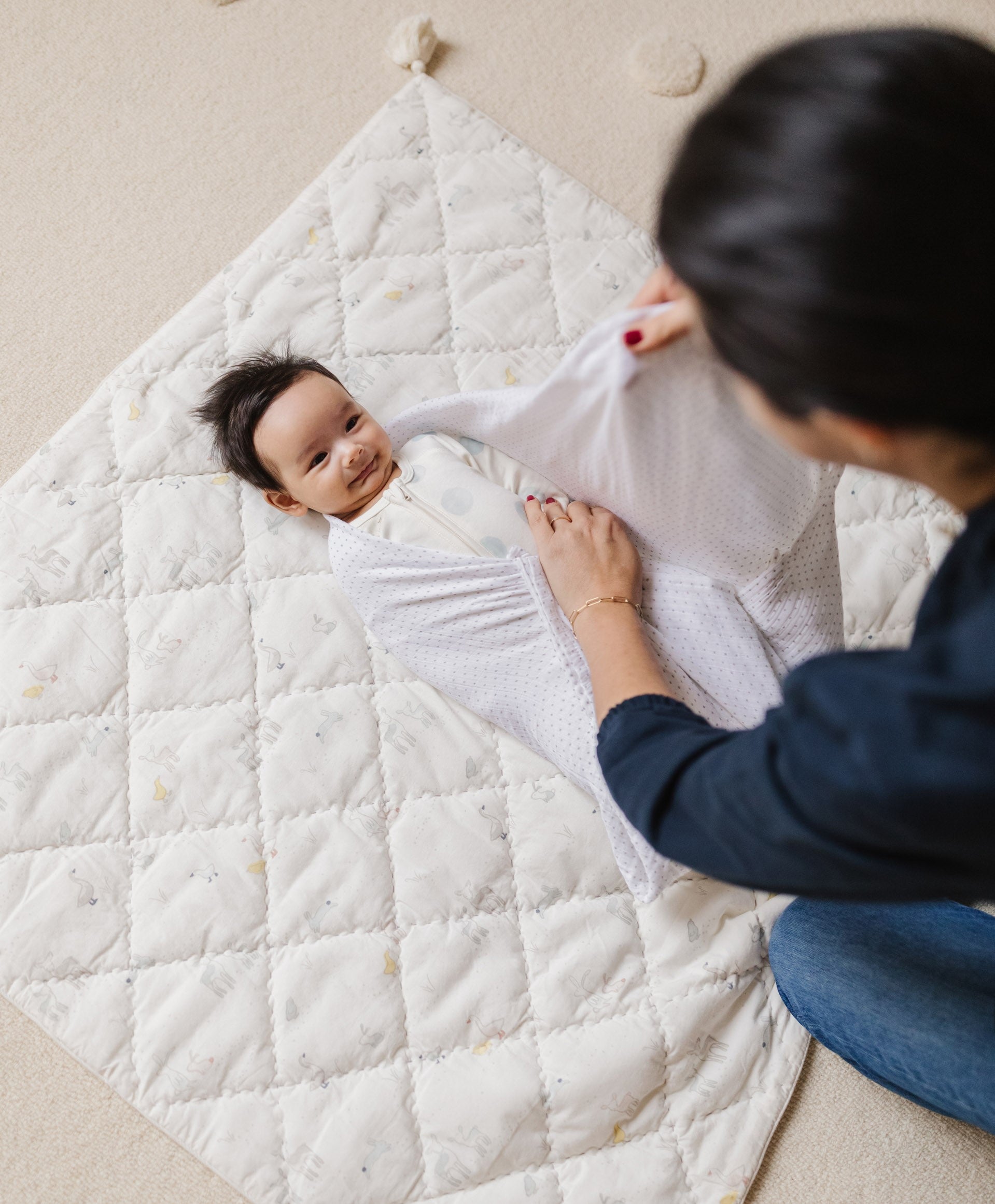 How To Swaddle Your Baby in 4 Steps Video & Guide Pehr