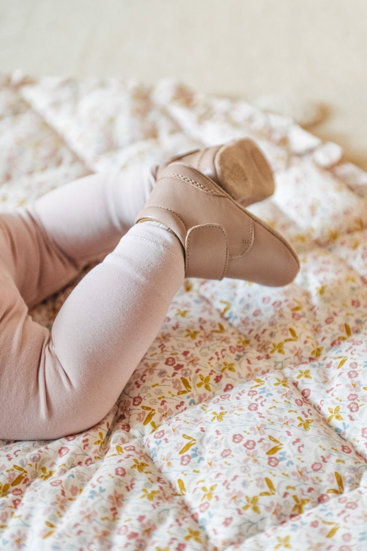 Floral Play Mat with baby's legs shown overtop