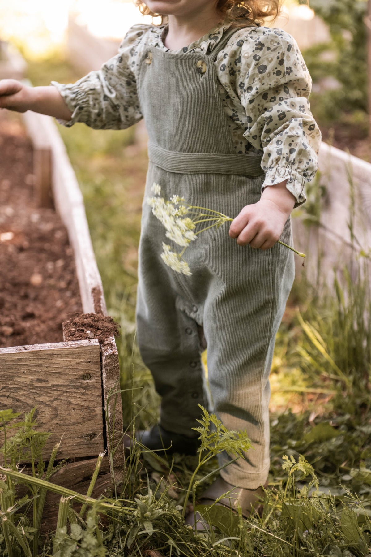 corduroy overall sage in greens pattern on toddler