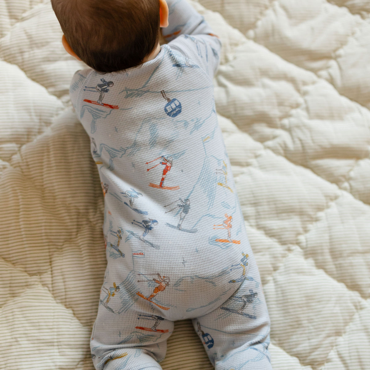 Petit Ski Raglan Romper - On The Slopes- Back of Baby- Long Sleeves and Legs- Blue
