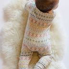 Petit Ski Raglan Romper - Snow Patrol- Back Of Baby- Colorful Print