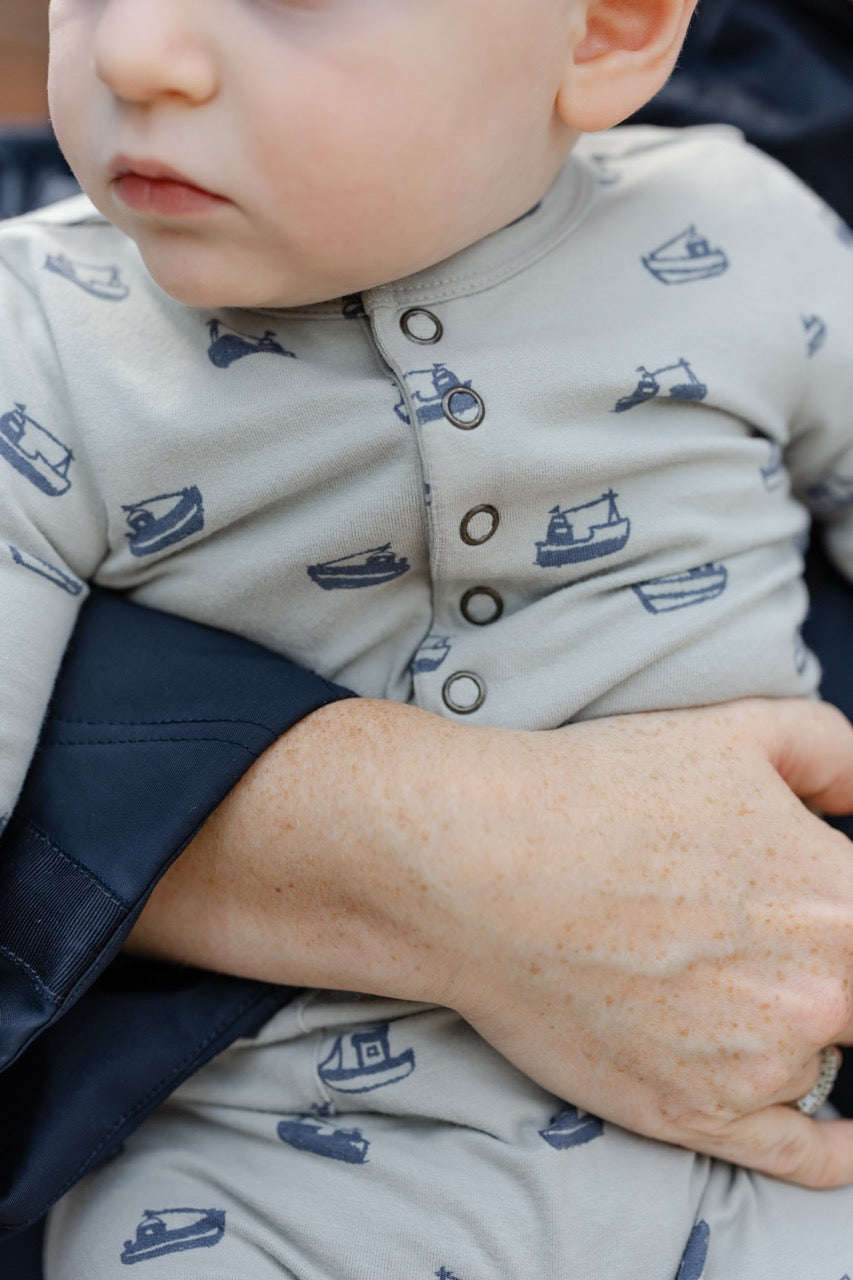 Essentials Henley Patch Pocket Romper - Tugboat- Up Close On Baby