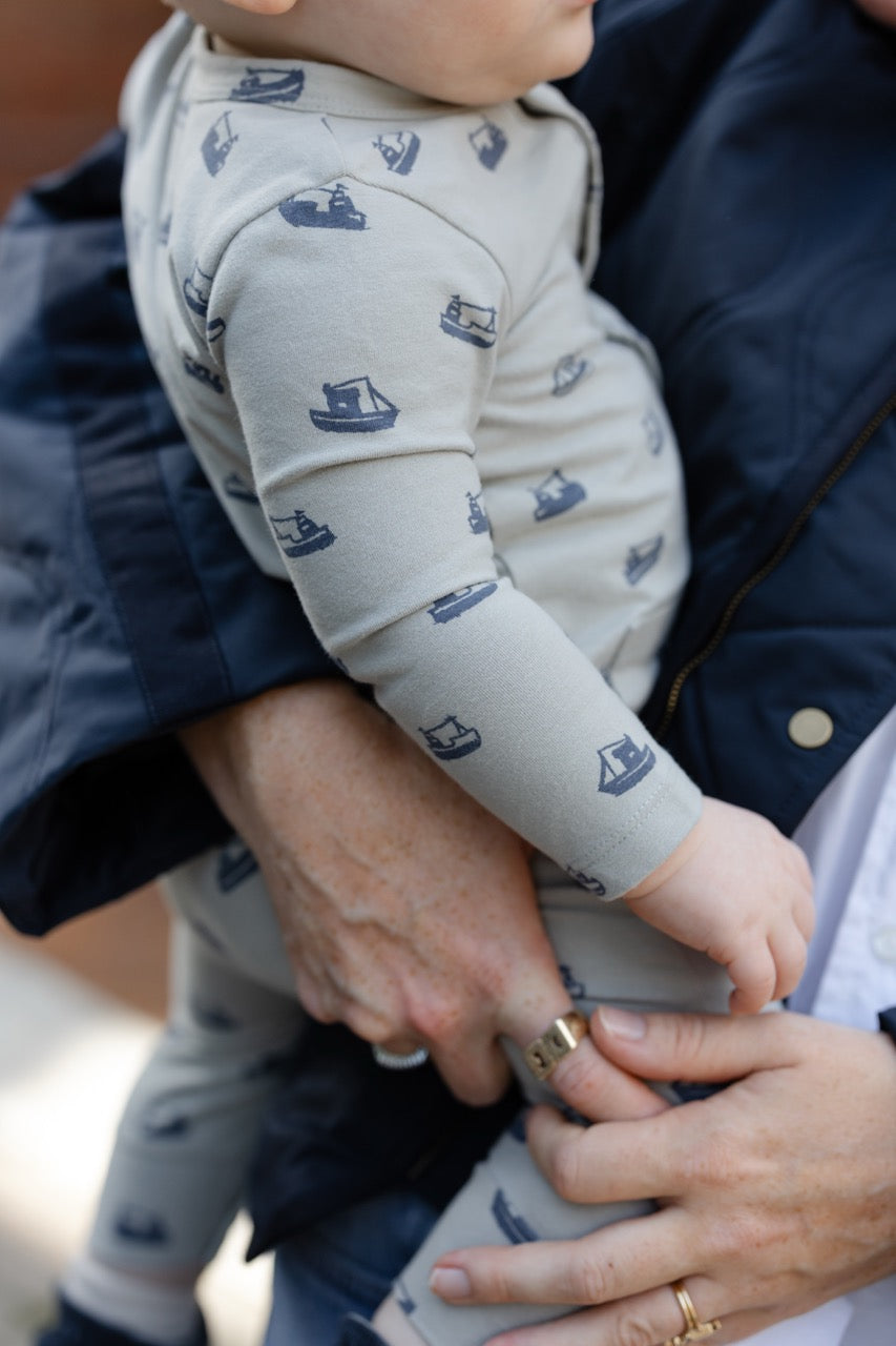 Essentials Henley Patch Pocket Romper - Tugboat- Up Close On Baby- Side