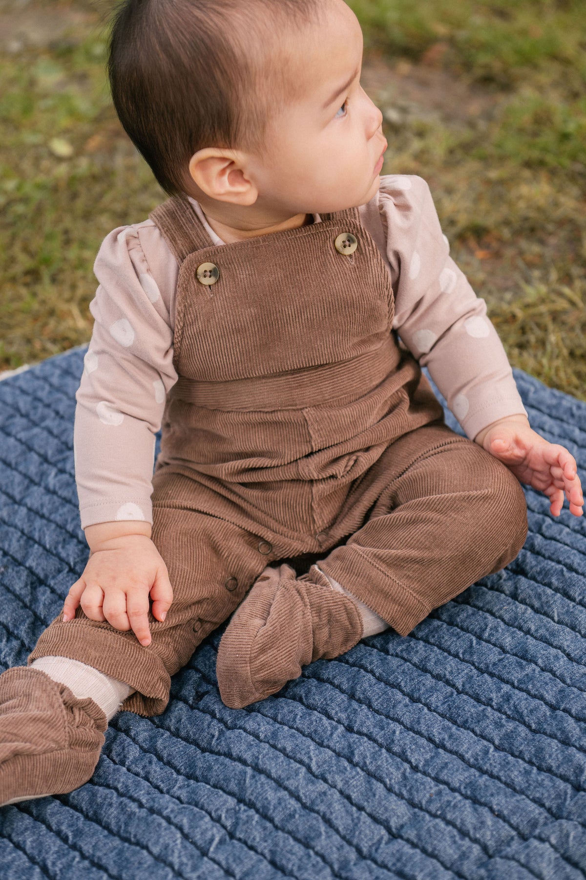 corduroy bootie portobello in neutrals pattern on baby with matching overalls
