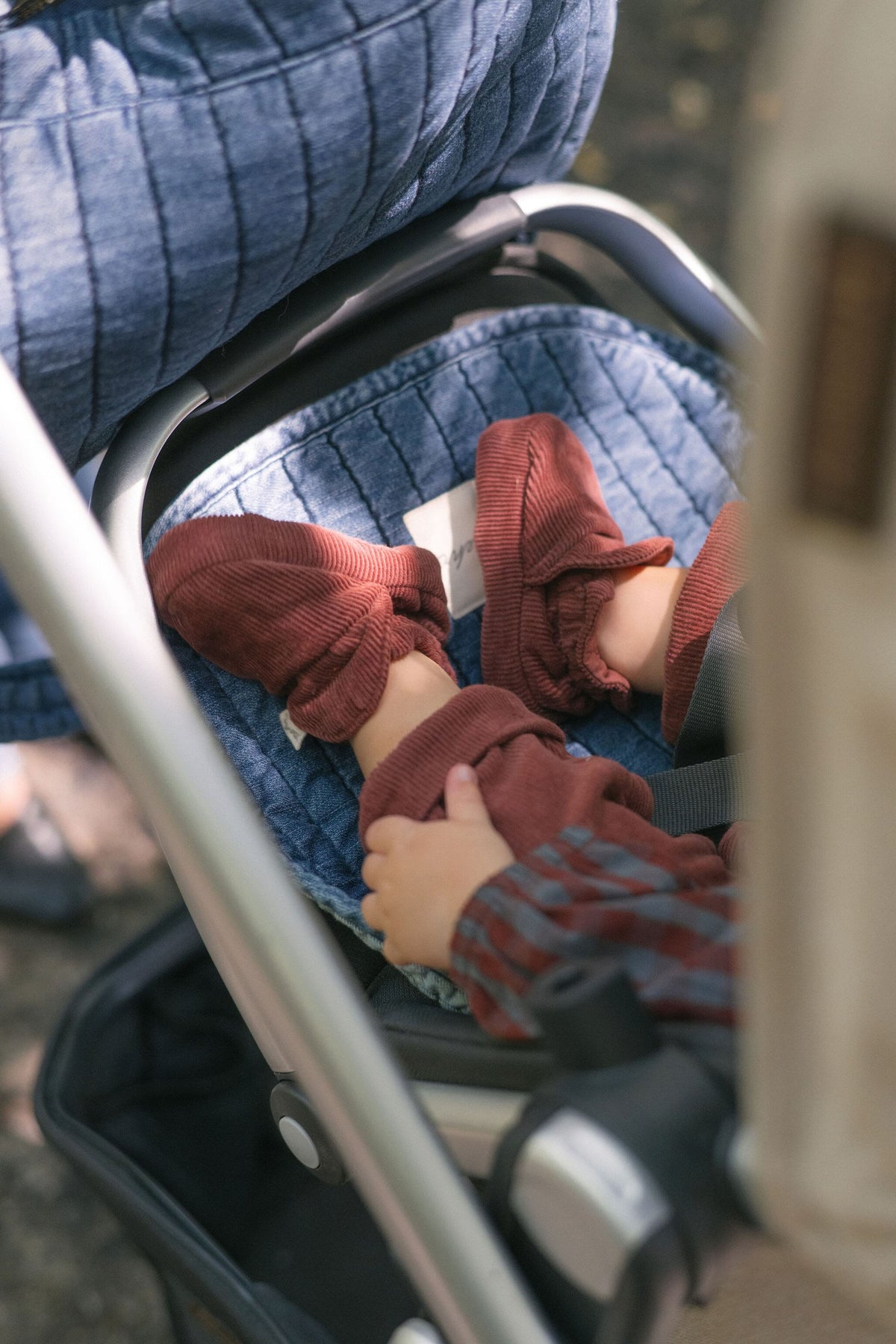 corduroy bootie mulberry on baby in stroller