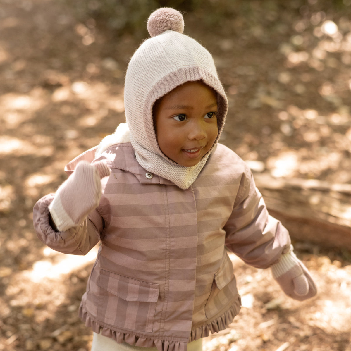 Toddler Wool Knit Balaclava - Natural - Rose- On Model- Storm Outerwear- Pink Furry Ball On Top
