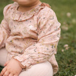 Woven Flutter Neck One-Piece - Wildflower- Front- On Model- Up Close