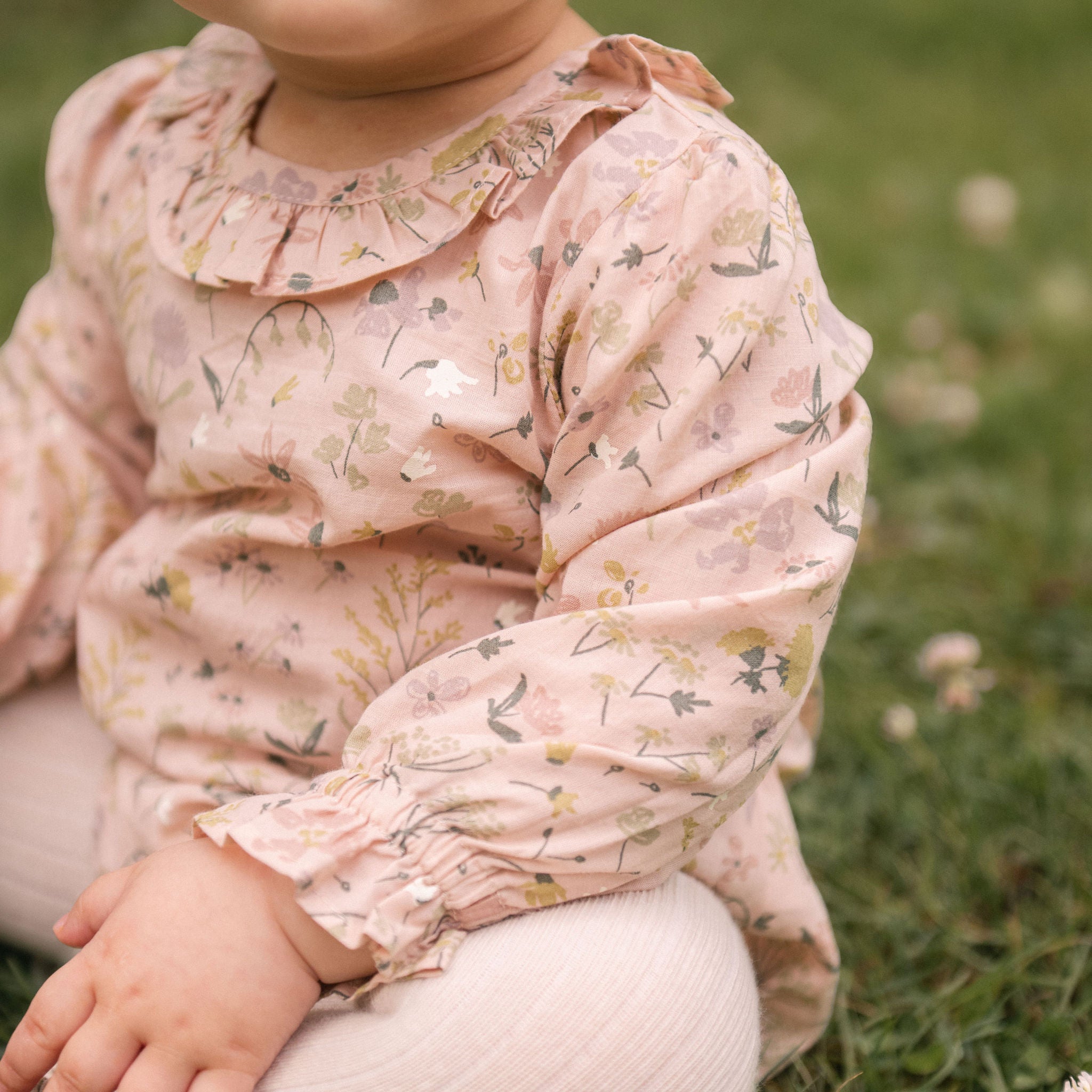 Woven Flutter Neck One-Piece - Wildflower- Front- On Model- Up Close