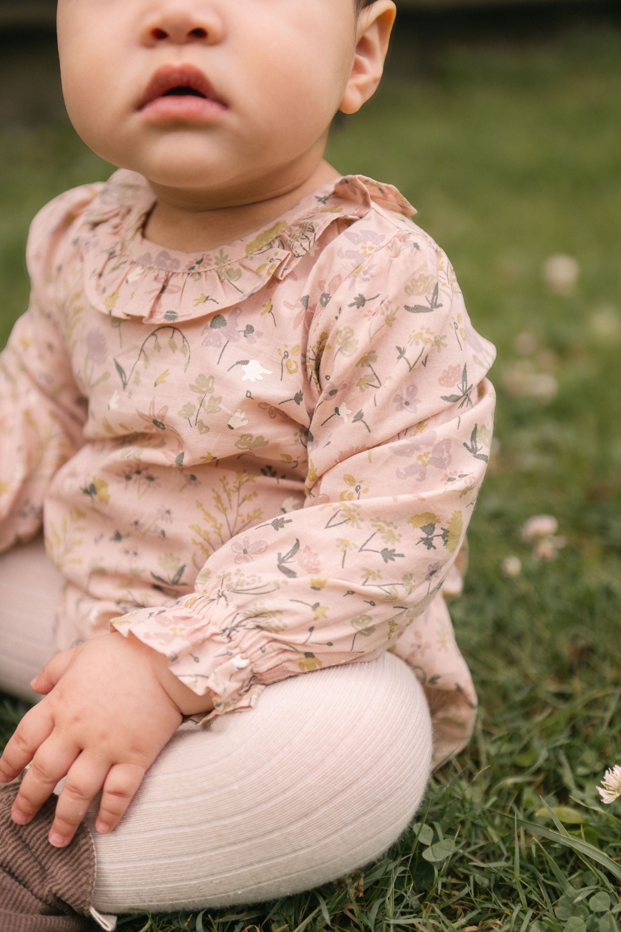 Woven Flutter Neck One-Piece - Wildflower- Front- On Model- Up Close