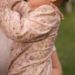 Woven Flutter Neck One-Piece - Wildflower- Side- On Model