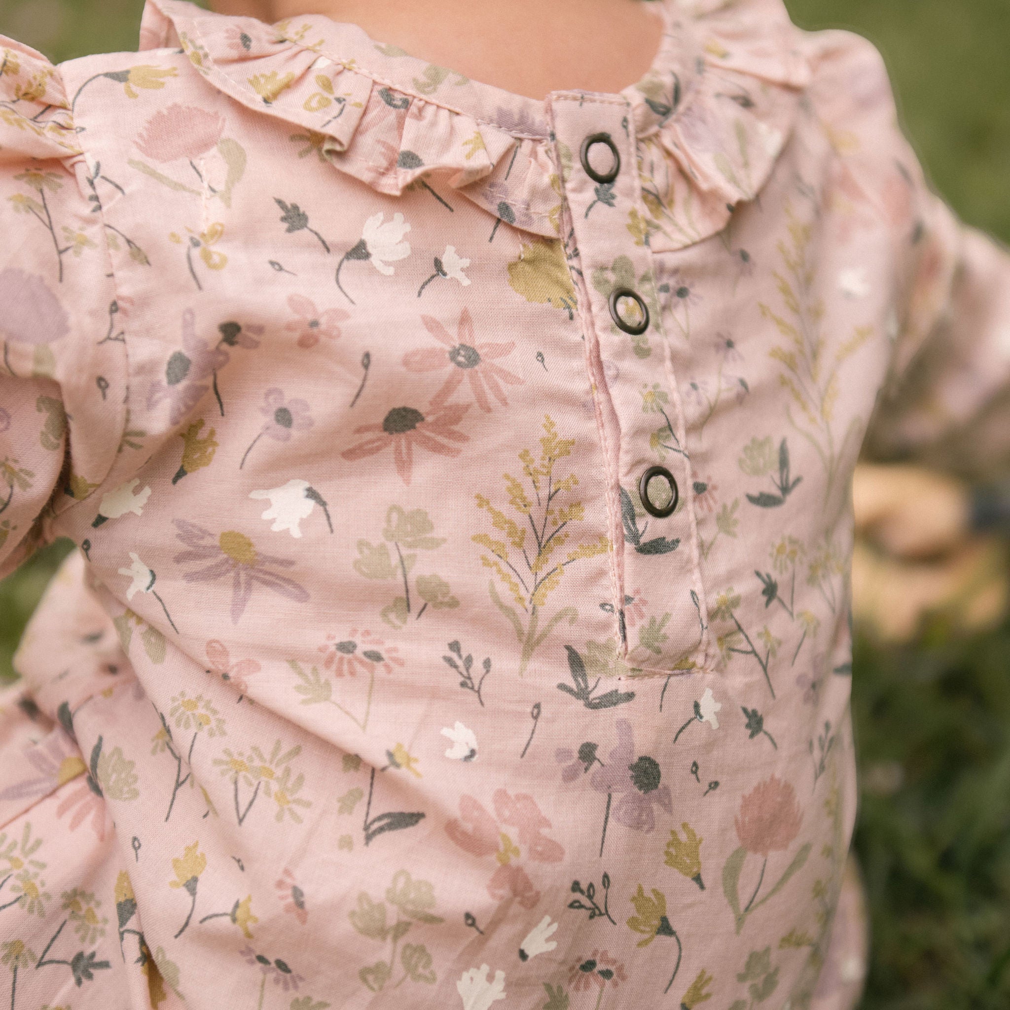Woven Flutter Neck One-Piece - Wildflower- Back- Up Close Buttons- On Model