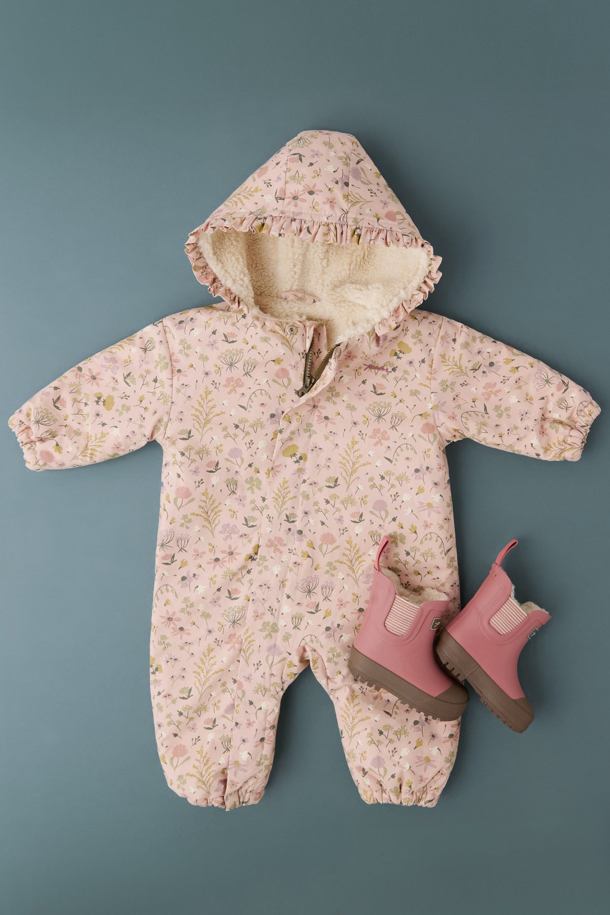 Sherpa Lined Storm Jacket with Ruffles - Wildflower- Flat Lay - Hood Ruffles and Sherpa- Pink Floral Print- Pathfinder Boot