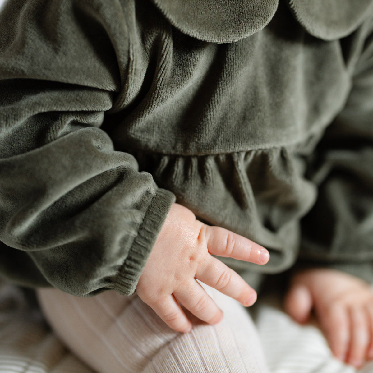 Velour Long Sleeve One-Piece with Peter Pan Collar - Pine- Up Close Sleeve on Baby- Green- Soft