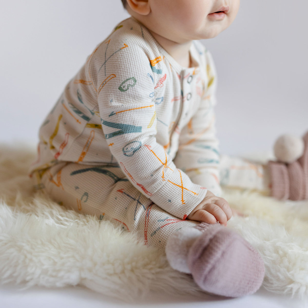 Petit Ski Raglan One-Piece - Apres- Up Close Baby- Colorful Ski Print