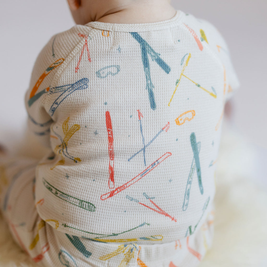 Petit Ski Raglan One-Piece - Apres- Back of Baby- Colorful Ski Print