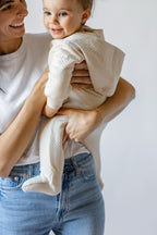Cloud Baby Suit - Natural- Mom Holding Baby- Footed- Hood