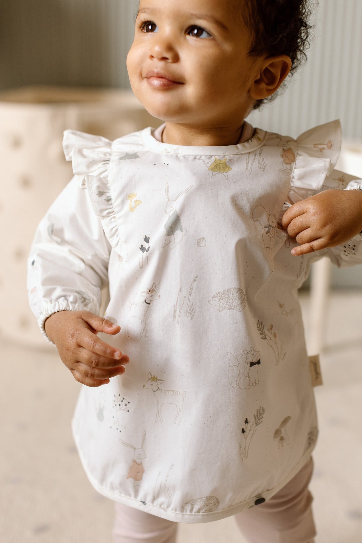 baby water repellent ruffle baby smock magical forest