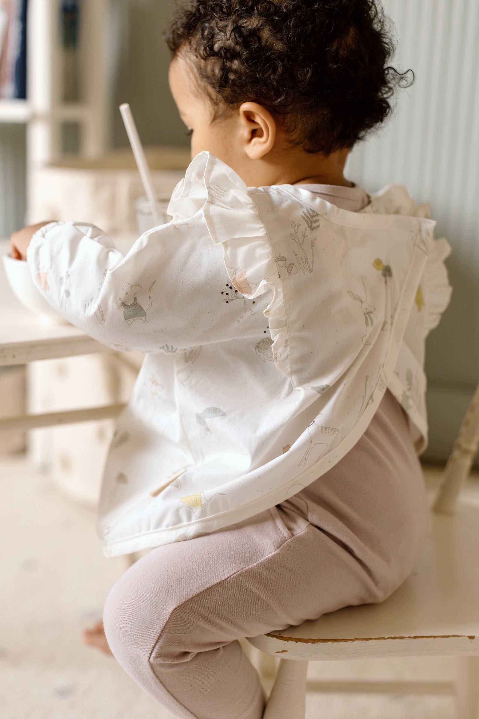 Water-Repellent Ruffle Baby Smock - Magical Forest