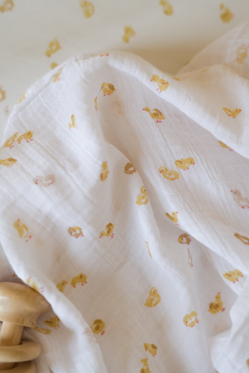 organic cotton muslin swaddle cheerful chick