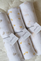 organic cotton muslin swaddle cheerful chick