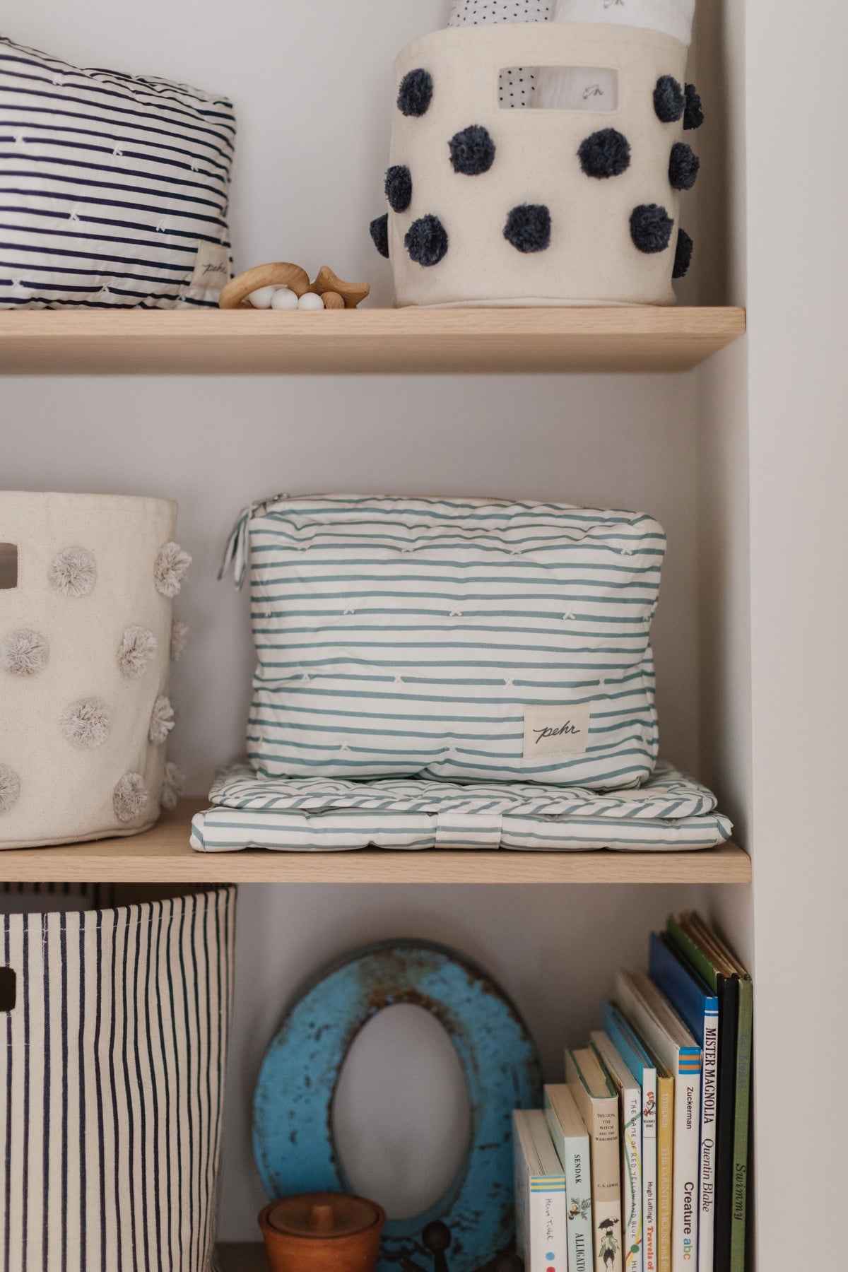 on the go pouch stripes away deep sea