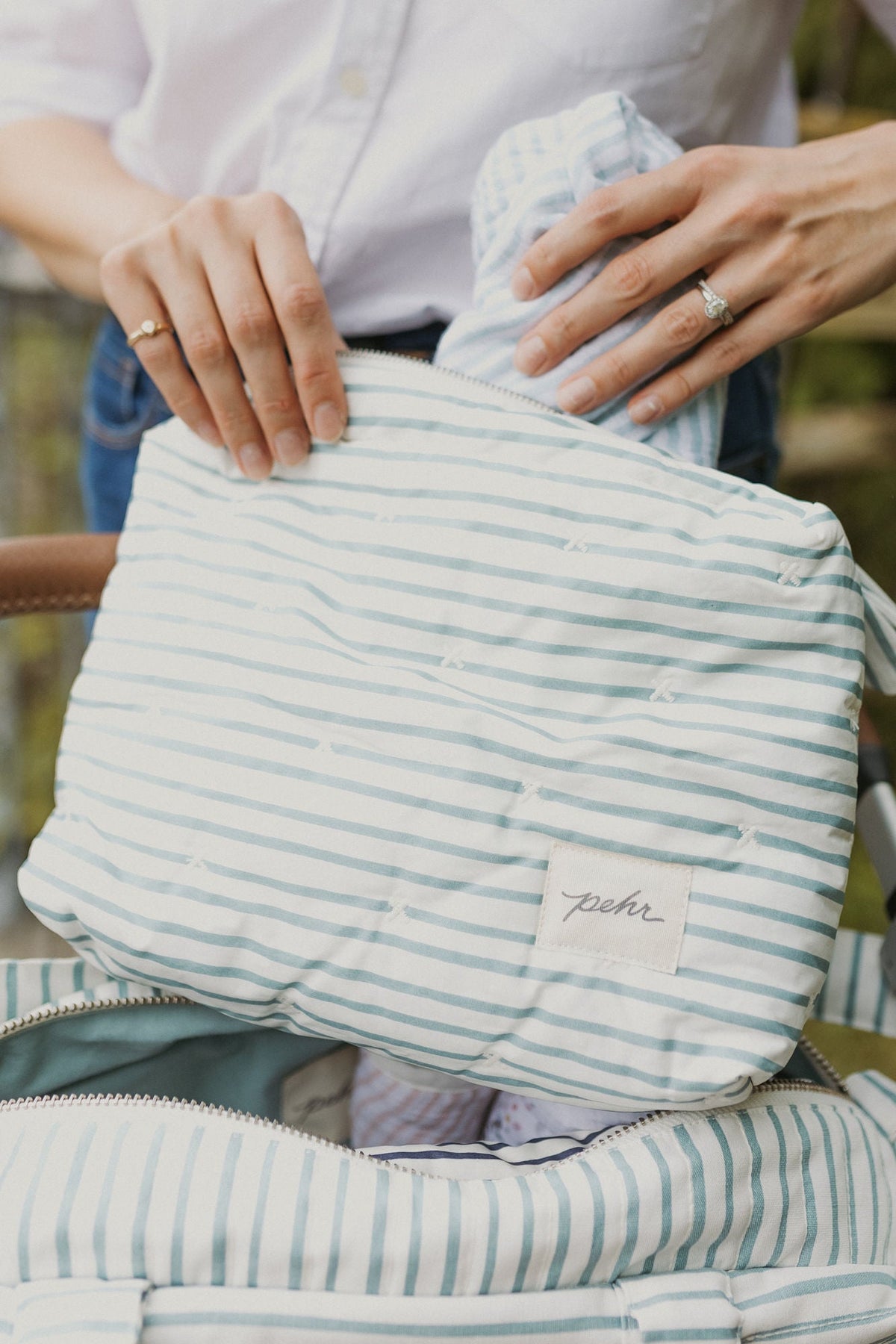 on the go pouch stripes away deep sea