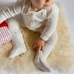 Ribbed Baby Sleeper - Celestial- On Baby- Holding Gift- Holiday- Footies