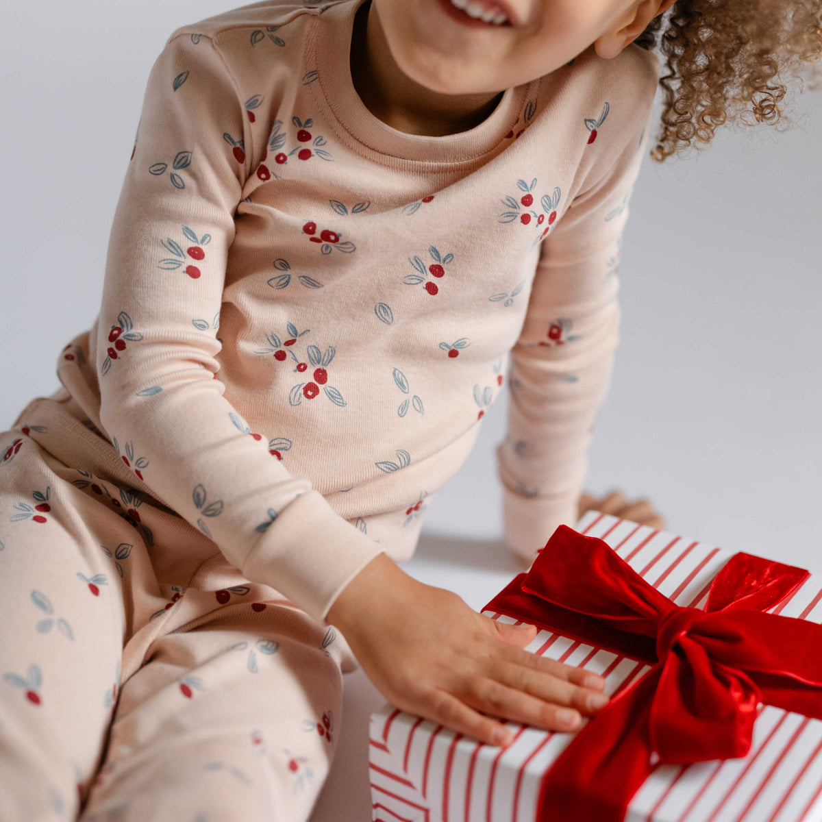 Ribbed Toddler Pajama - Berry Lane- On Child With Present- Holiday Print-Pink With Berries