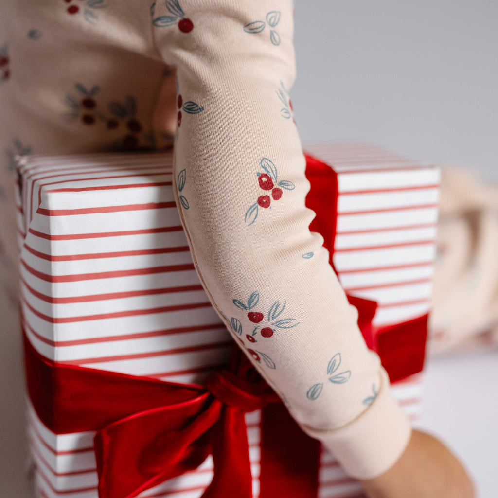 Ribbed Toddler Pajama - Berry Lane- On Child Up Close With Present
