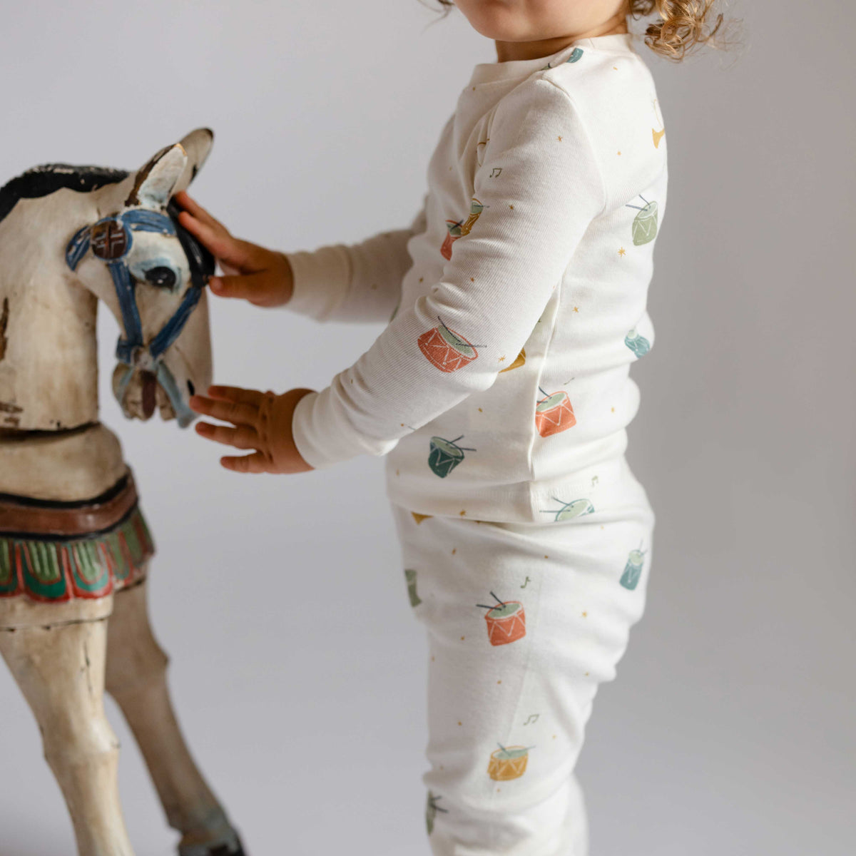 Ribbed Toddler Pajama - Little Drummer- On Toddler- Holding Rocking Horse