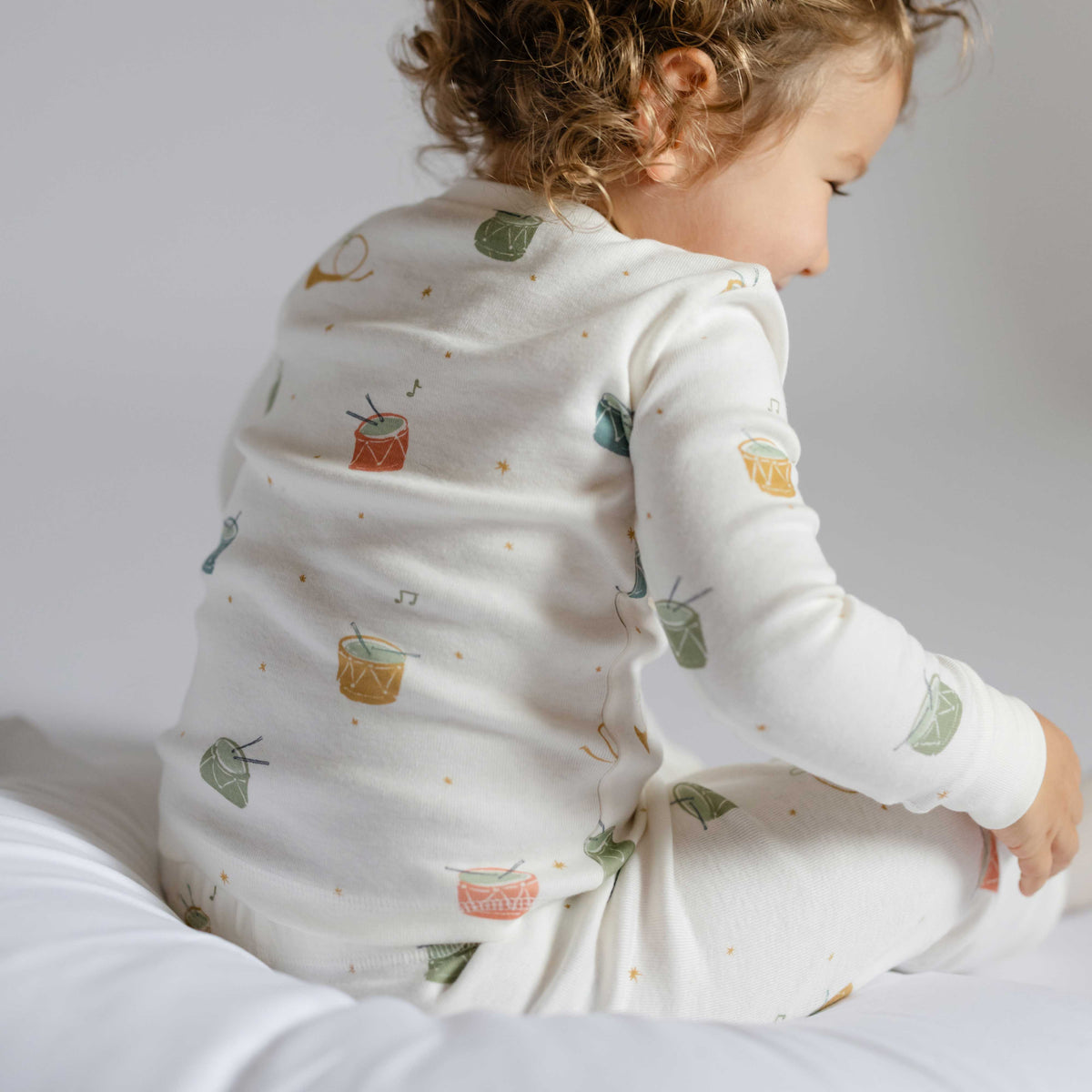 Ribbed Toddler Pajama - Little Drummer- Back Of Toddler Up Close- White With Colorful Drums- Holiday