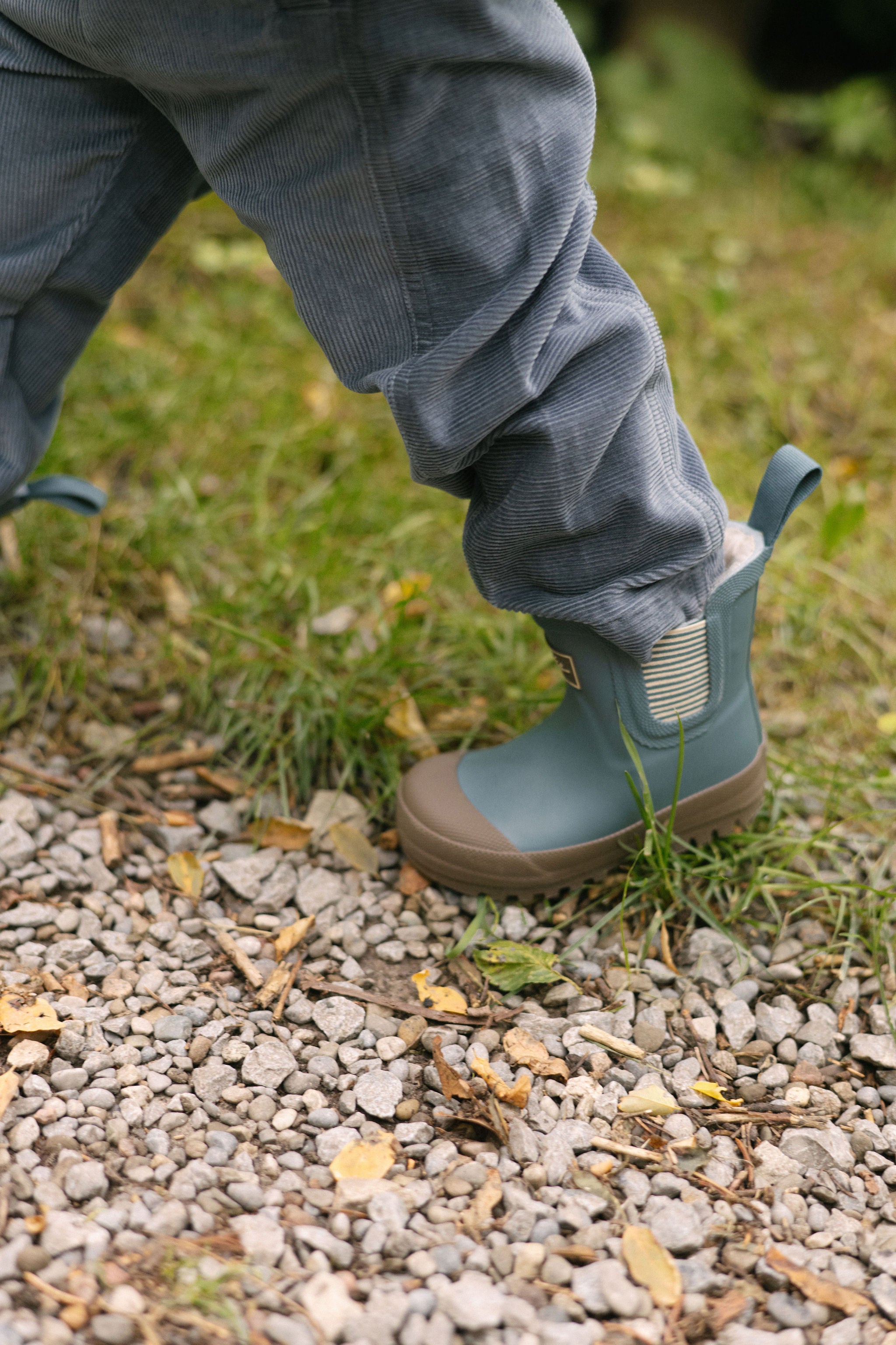 Corduroy Pant - Harbor- Up Close- Side- Tucked Into Boot On Model