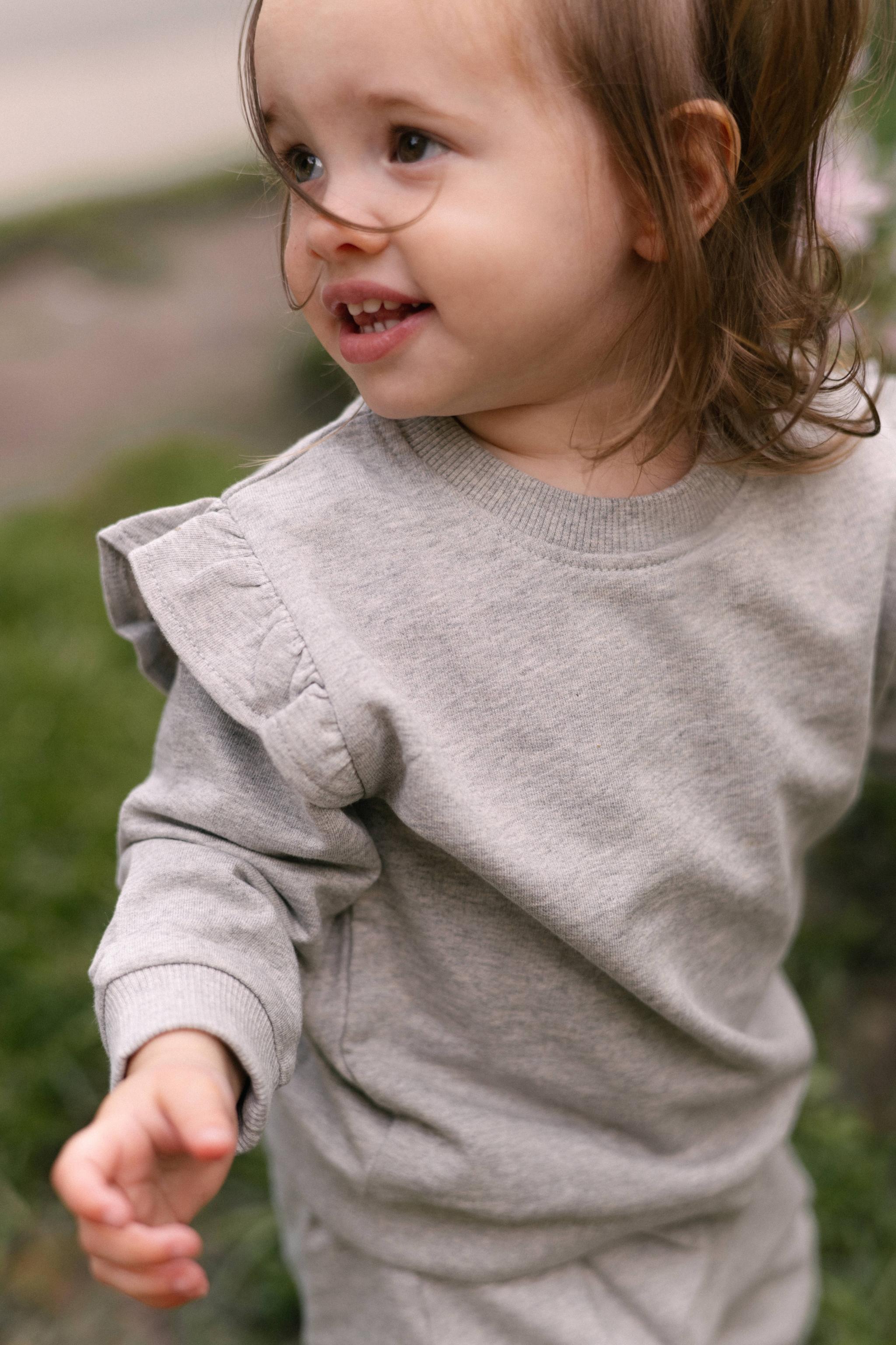 French Terry Toddler Ruffle Sweatshirt - Heather Grey- Front- Up Close- On Model
