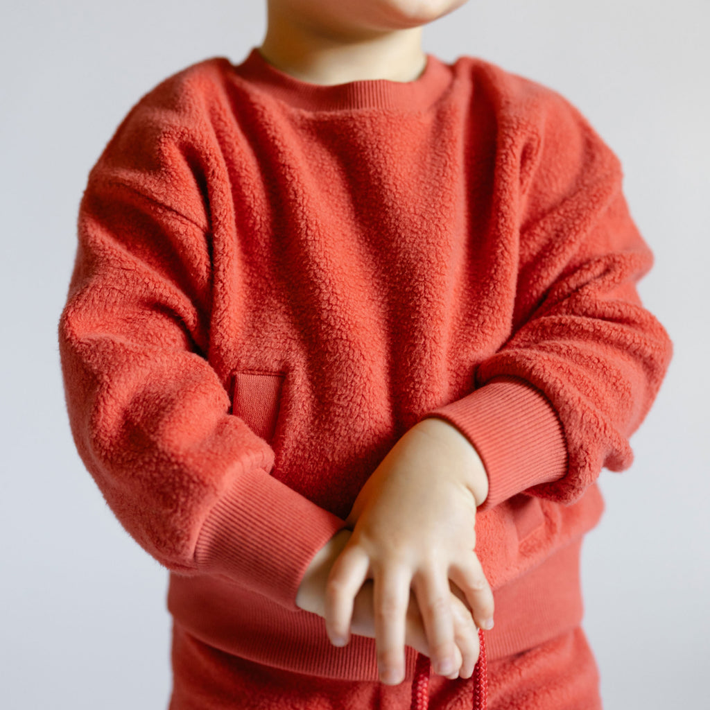 Teddy Fleece Dropped Shoulder Sweatshirt - Apple- On Toddler- Kangaroo Pocket