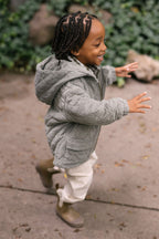 corduroy quilted jacket sage in greens pattern side view on toddler with hood