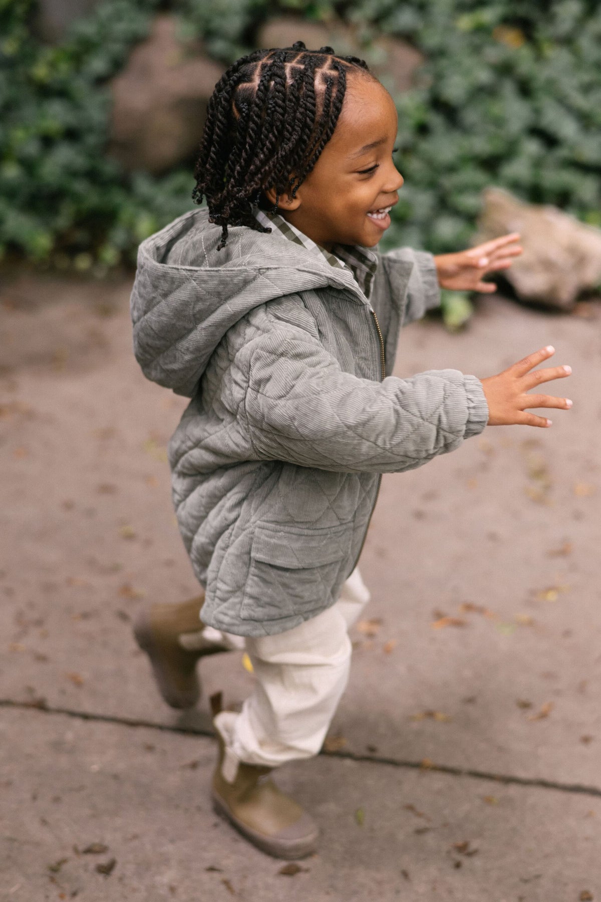 corduroy quilted jacket sage in greens pattern side view on toddler with hood