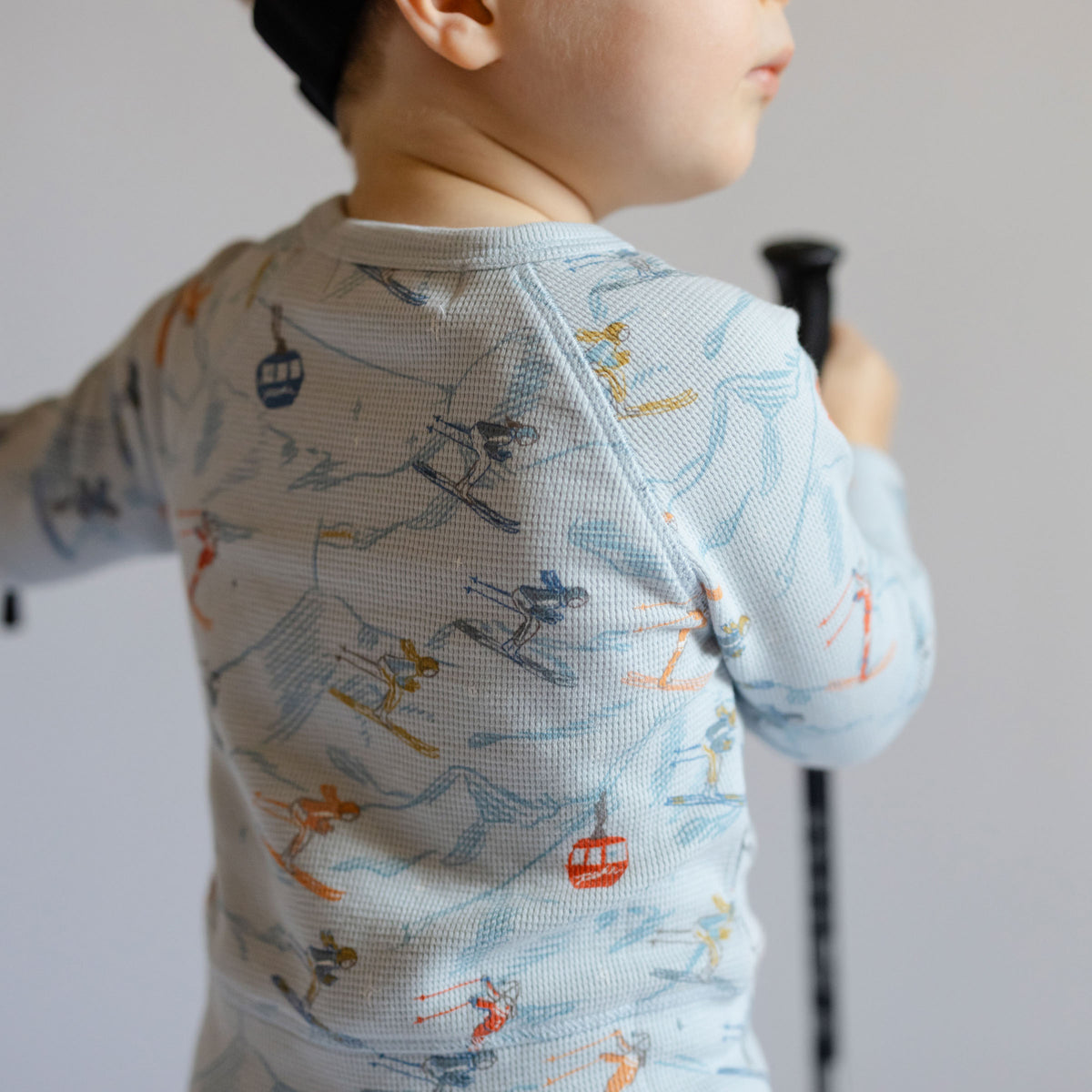 Petit Ski Long Sleeve Raglan Top - On The Slopes- Back of Toddler- Blue