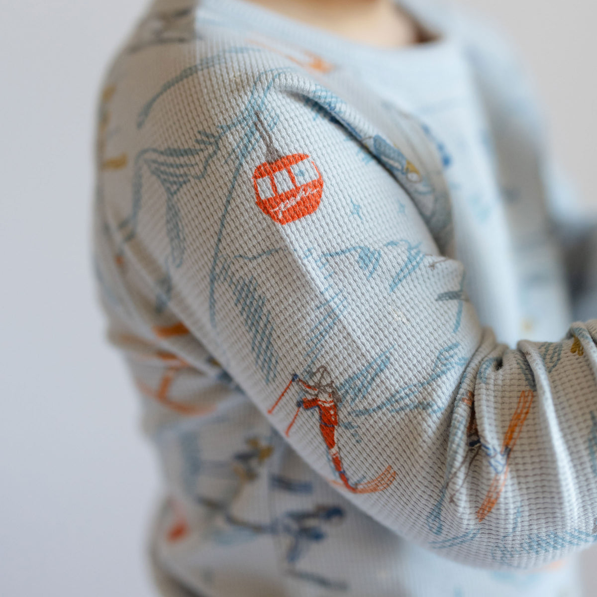 Petit Ski Long Sleeve Raglan Top - On The Slopes- Side of Toddler- Blue Ski Print