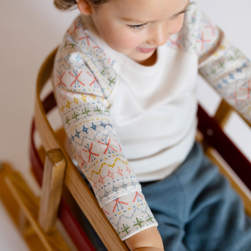 Petit Ski Long Sleeve Raglan Top - Snow Patrol- On Toddler- White With Colorful Sleeve Blocks