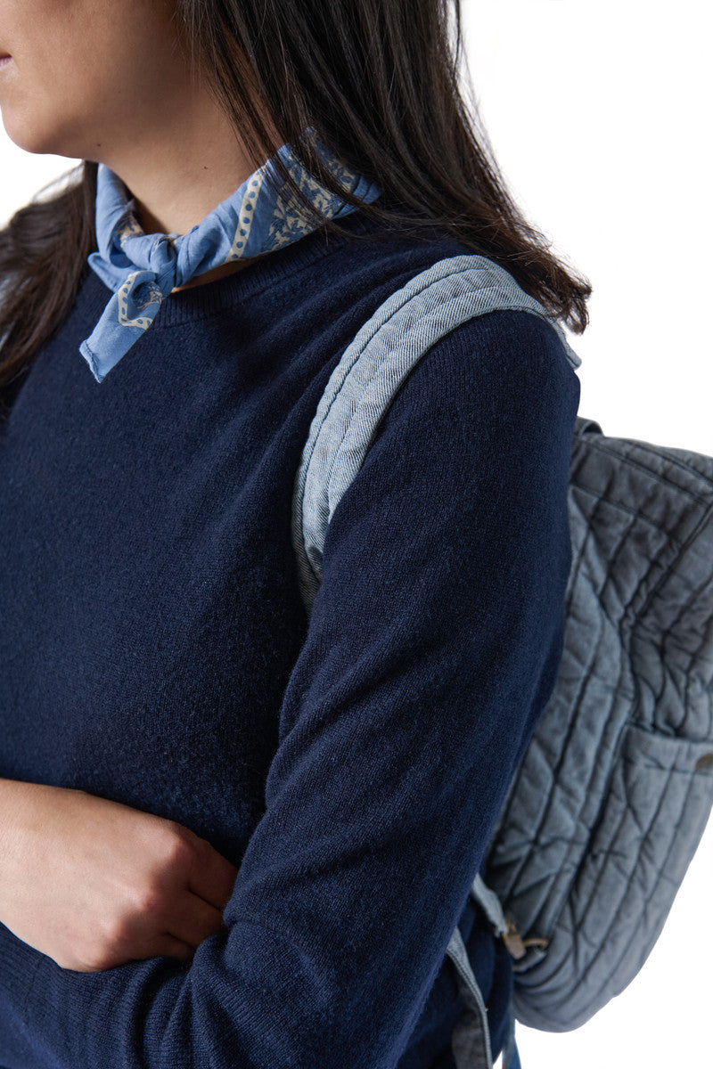 Soft Indigo Twill Convertible Diaper Bag On Model - Backpack View