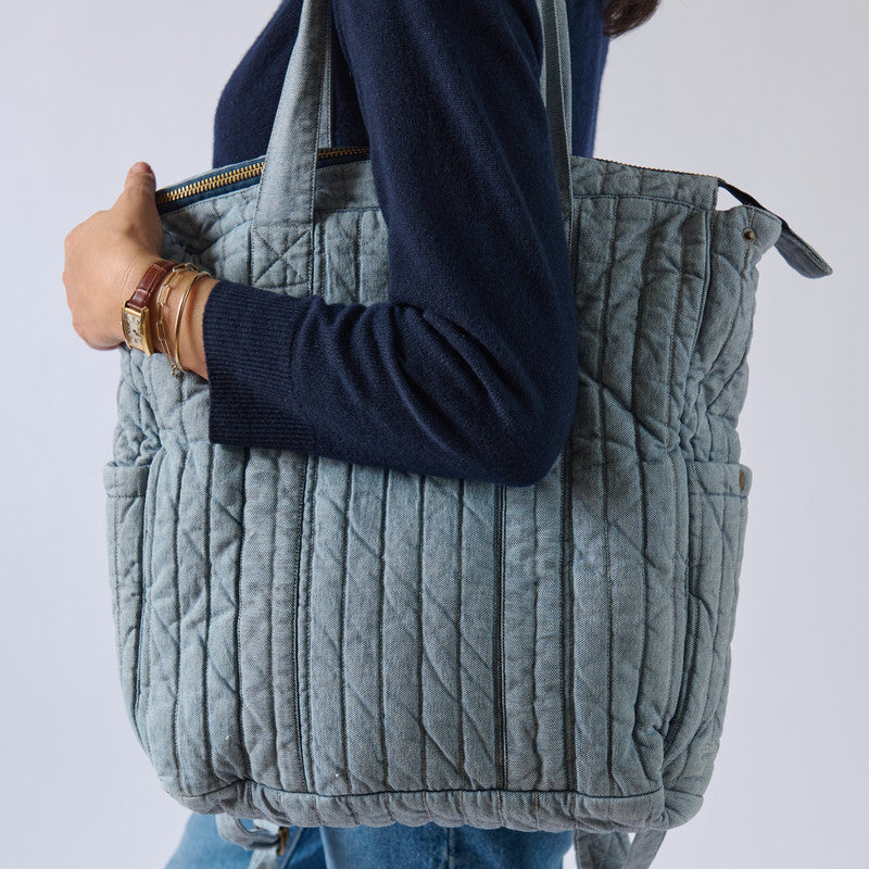 Soft Indigo Twill Convertible Diaper Bag On Model - Side View