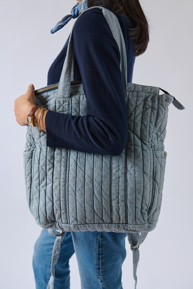 Soft Indigo Twill Convertible Diaper Bag On Model - Side View