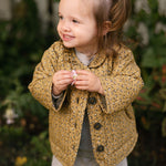 Coated Quilted Ruffle Jacket - Spotted- On Model- Front
