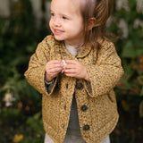 Coated Quilted Ruffle Jacket - Spotted- On Model- Front