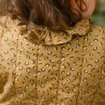 Coated Quilted Ruffle Jacket - Spotted- On Mode- Back- Up Close