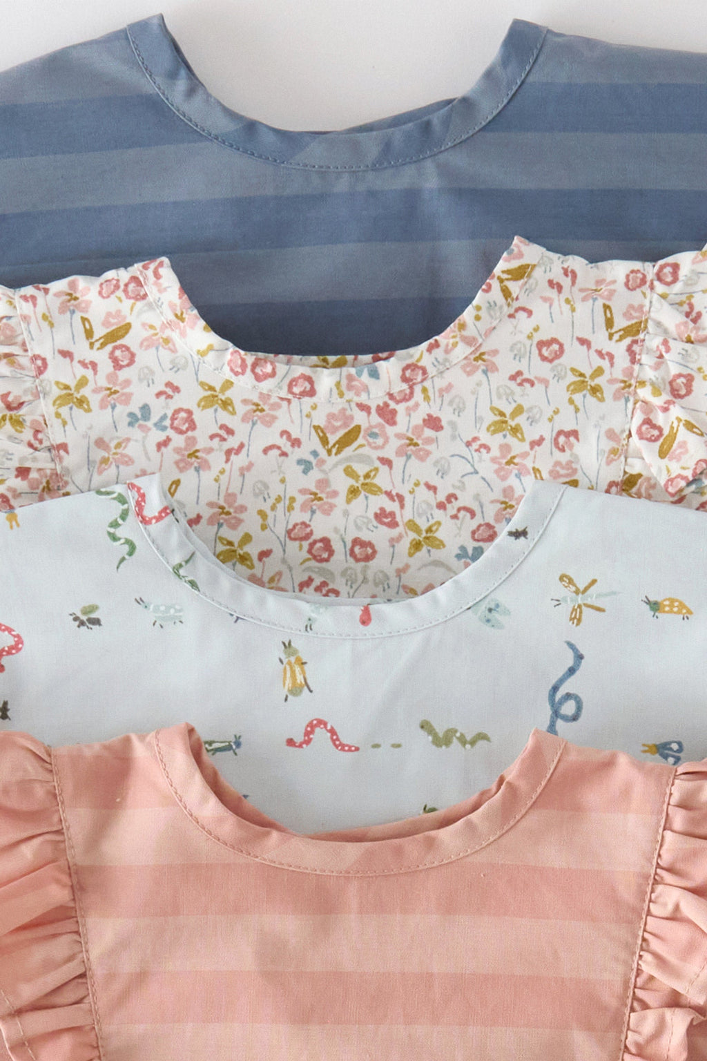 baby water repellent ruffle baby smock pink sky