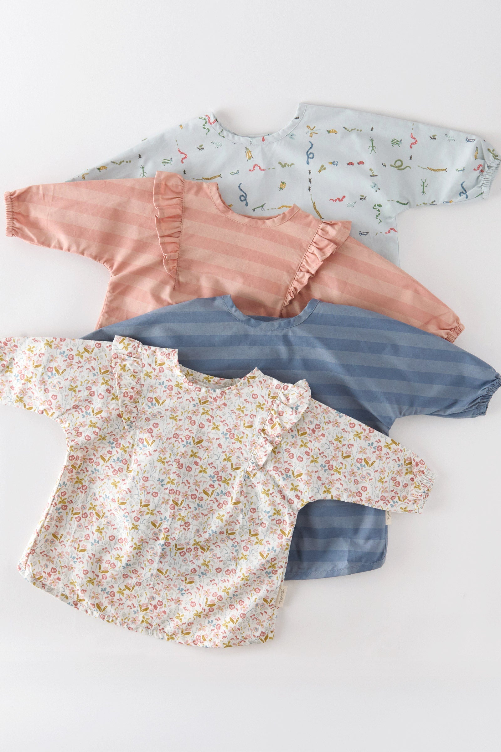 baby water repellent ruffle baby smock pink sky