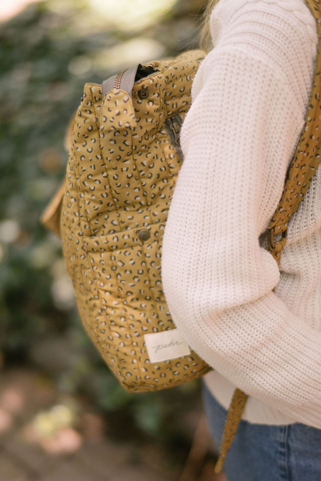 Printed Convertible Diaper Bag - Spotted- Side View On Model- Backpack