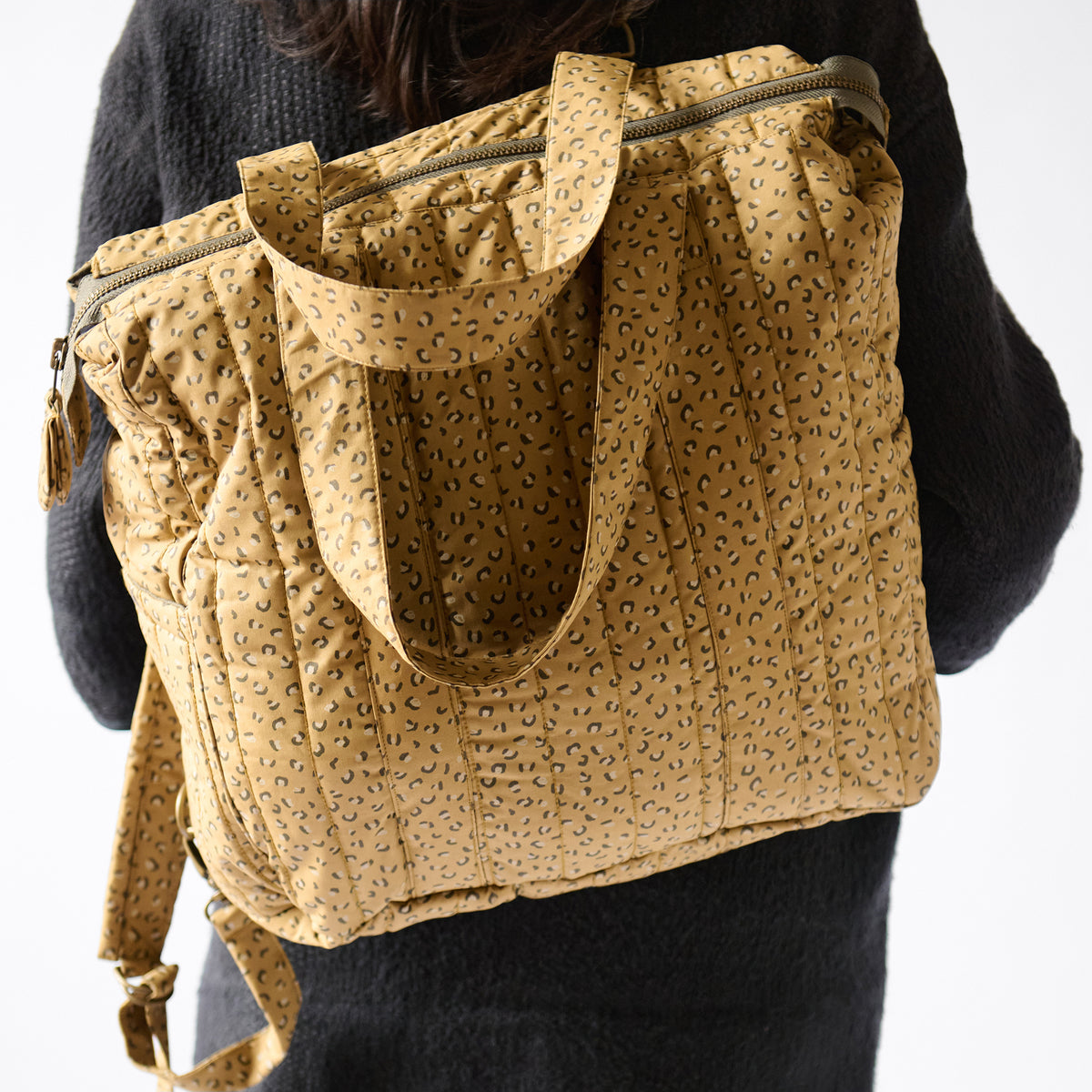 Convertible Diaper Bag- Spotted- On Model as Backpack