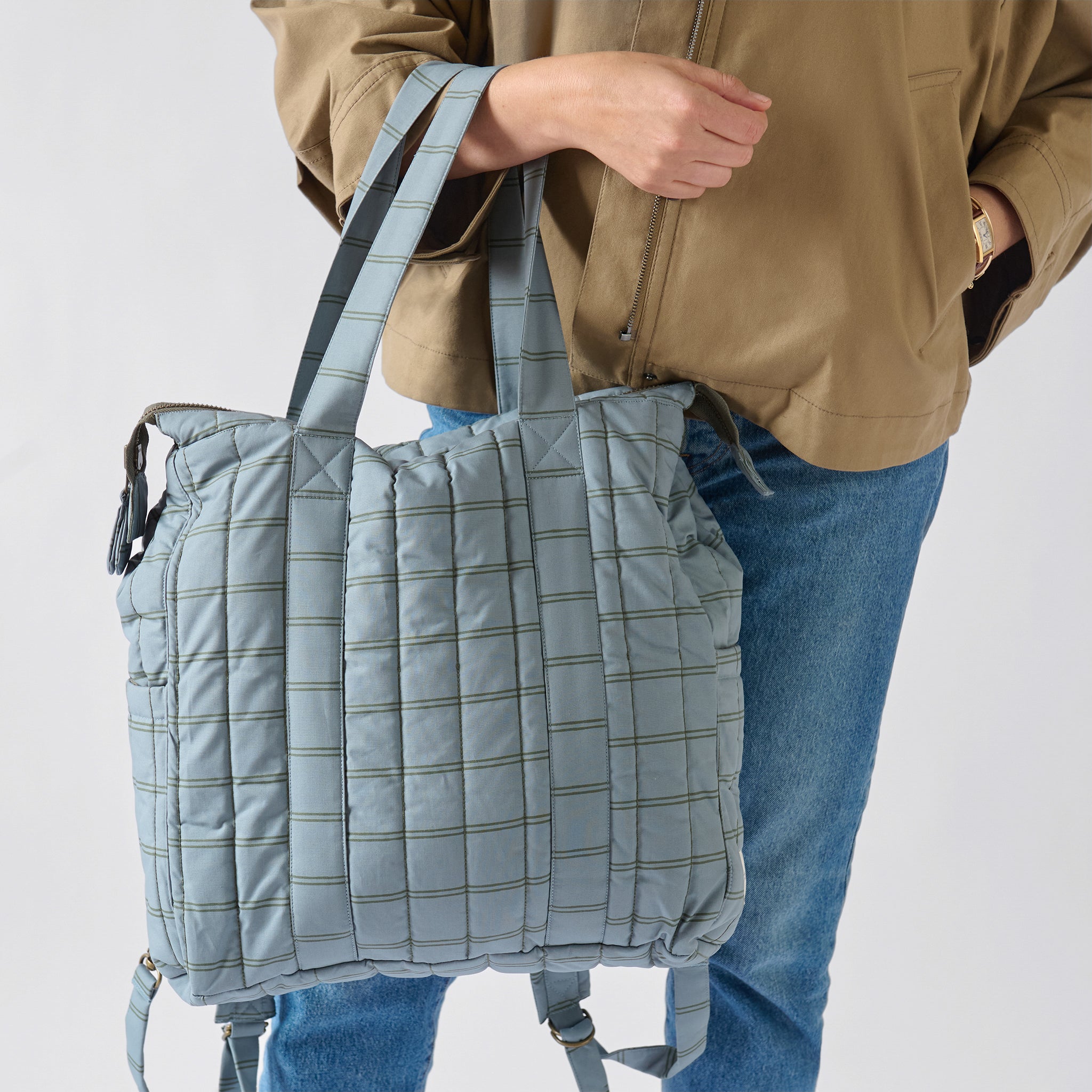 Windowpane- Convertible Diaper Bag- Model Holding as Tote